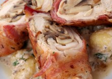 Chicken rolled in bacon with baked gnocchi in sauce
